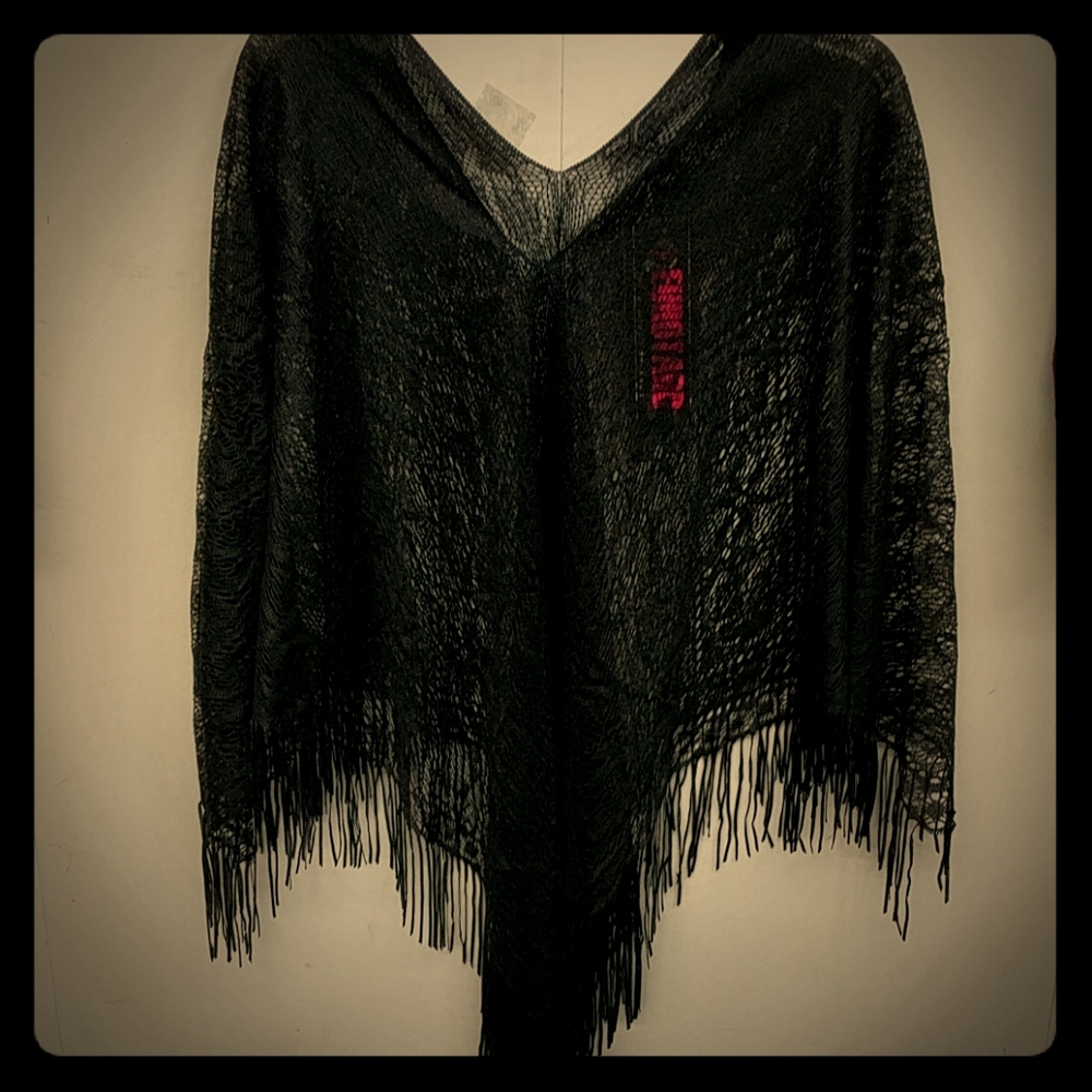 Fringed lacy shawl